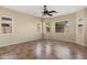 Bright and airy living room with multiple windows and tile flooring at 2832 E Flower St, Gilbert, AZ 85298