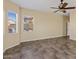Spacious living area featuring large windows and tile floors at 2832 E Flower St, Gilbert, AZ 85298