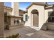 Outdoor patio with fireplace and entrance to the home at 2832 E Flower St, Gilbert, AZ 85298