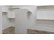 Large walk-in closet with ample shelving and hanging space at 2832 E Flower St, Gilbert, AZ 85298
