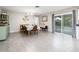 Charming dining room featuring a table with leather chairs and sliding glass door at 2839 W Charleston Ave, Phoenix, AZ 85053