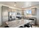 Modern kitchen with stainless steel appliances and granite countertops at 29616 N 140Th St, Scottsdale, AZ 85262