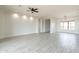 Spacious living room offering neutral walls and tile flooring at 30039 N 209Th Ave, Wittmann, AZ 85361
