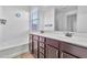 Bathroom boasts double vanity and soaking tub at 34384 N Barka Trl, San Tan Valley, AZ 85143