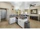 Kitchen with island, stainless steel appliances, and backyard access at 35119 N 10Th St, Phoenix, AZ 85086