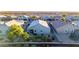 Aerial view showcasing the house and surrounding homes at 41844 W Rosa Dr, Maricopa, AZ 85138