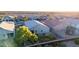 Aerial view showcasing the house and surrounding homes at 41844 W Rosa Dr, Maricopa, AZ 85138