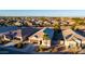 Aerial view of the house and surrounding neighborhood at 41844 W Rosa Dr, Maricopa, AZ 85138