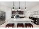 Modern kitchen with stainless steel appliances and ample cabinet space at 41844 W Rosa Dr, Maricopa, AZ 85138