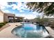 Relaxing pool area with patio furniture and a covered patio at 4324 S Primrose Dr, Gold Canyon, AZ 85118