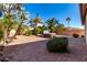 Backyard with hot tub, landscaping, and gravel at 5512 W Cavedale Dr, Phoenix, AZ 85083