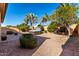 Backyard oasis with hot tub and desert landscaping at 5512 W Cavedale Dr, Phoenix, AZ 85083