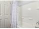 Bathroom with shower/tub combo and patterned curtain at 5512 W Cavedale Dr, Phoenix, AZ 85083