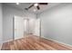 Bedroom with wood flooring and access to hallway at 5512 W Cavedale Dr, Phoenix, AZ 85083
