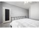 Spacious bedroom with ceiling fan and private door at 5512 W Cavedale Dr, Phoenix, AZ 85083