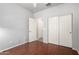 Bedroom with wood floors and access to other rooms at 5512 W Cavedale Dr, Phoenix, AZ 85083