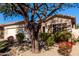 One-story house with a two-car garage and mature trees at 5512 W Cavedale Dr, Phoenix, AZ 85083