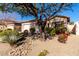 One story house with a two-car garage and landscaped yard at 5512 W Cavedale Dr, Phoenix, AZ 85083