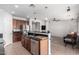 Open kitchen with island and stainless steel appliances at 5512 W Cavedale Dr, Phoenix, AZ 85083