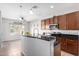 Kitchen boasts granite countertops and modern cabinetry at 5512 W Cavedale Dr, Phoenix, AZ 85083