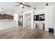 Open concept living room with a view of the kitchen at 5512 W Cavedale Dr, Phoenix, AZ 85083