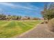 Landscaped green space with walking paths and mountain views at 5512 W Cavedale Dr, Phoenix, AZ 85083
