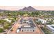 Under construction home, aerial view, mountain backdrop at 5524 N Homestead Ln, Paradise Valley, AZ 85253