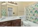 Clean bathroom with shower/tub, vanity, and toilet at 5530 N 47Th Ave, Glendale, AZ 85301