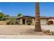 Ranch style home with brick facade, attached garage, and desert landscaping at 5530 N 47Th Ave, Glendale, AZ 85301