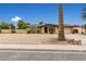 Ranch style home with a large front yard and a two car garage at 5530 N 47Th Ave, Glendale, AZ 85301