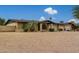 Landscaped front yard with a single story home and a two-car garage at 5530 N 47Th Ave, Glendale, AZ 85301