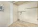 Laundry area with shelving and tiled floor at 5530 N 47Th Ave, Glendale, AZ 85301