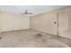 Spacious living room with ceiling fan and carpet at 5530 N 47Th Ave, Glendale, AZ 85301