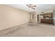 Living room with kitchen view and ceiling fan at 5530 N 47Th Ave, Glendale, AZ 85301