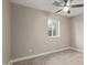 Simple bedroom with wood-look floors and a window at 6443 E Alder Ave, Mesa, AZ 85206