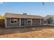 Newly renovated home with covered porch and large yard at 6443 E Alder Ave, Mesa, AZ 85206