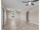 Spacious living area featuring tile floors and ceiling fans at 6443 E Alder Ave, Mesa, AZ 85206
