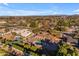 Aerial view showcasing a home with two pools and a solar panel system at 6613 W Sweetwater Ave, Glendale, AZ 85304