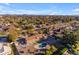 Aerial view of a single story home with pool and lush landscape at 6613 W Sweetwater Ave, Glendale, AZ 85304