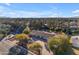 Aerial view of house with a large yard and mountain views at 6613 W Sweetwater Ave, Glendale, AZ 85304