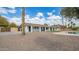 Home's back exterior, pool, and patio area at 6613 W Sweetwater Ave, Glendale, AZ 85304