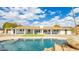 Updated home with inviting pool and patio area, perfect for outdoor entertaining at 6613 W Sweetwater Ave, Glendale, AZ 85304