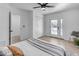 Bedroom with backyard access, ceiling fan and closet at 6613 W Sweetwater Ave, Glendale, AZ 85304