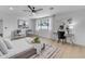 Light and airy bedroom with a large window and workspace at 6613 W Sweetwater Ave, Glendale, AZ 85304