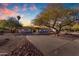 Updated home with a long driveway and mature trees at 6613 W Sweetwater Ave, Glendale, AZ 85304