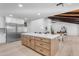Modern kitchen with stainless steel appliances and a large island at 6613 W Sweetwater Ave, Glendale, AZ 85304
