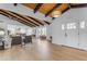 Spacious living room with hardwood floors, high ceilings, and an open floor plan at 6613 W Sweetwater Ave, Glendale, AZ 85304