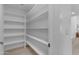 Bright and spacious pantry with ample shelving at 6613 W Sweetwater Ave, Glendale, AZ 85304
