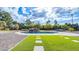 Stunning pool and spa with a waterfall feature, surrounded by lush landscaping at 6613 W Sweetwater Ave, Glendale, AZ 85304