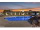 Newly renovated pool and patio area with a modern design at 6613 W Sweetwater Ave, Glendale, AZ 85304